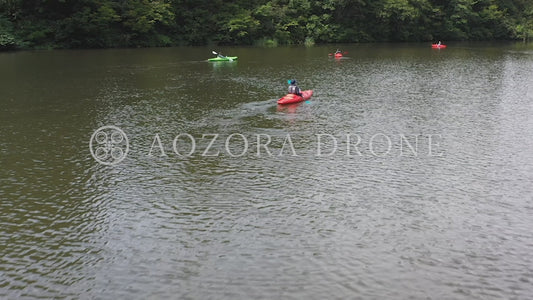 Drone video footage of a man kayaking in Daigenta Canyon [Echigo Yuzawa, Niigata Prefecture, Lake Daigenta]