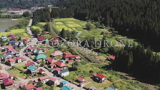 Tadami Line running through Taishi village surrounded by fields Original scenery of Japan Drone video material [Fukushima Prefecture, Okuaizu, Kanayama Town/Oku-Tadami Tadami River]